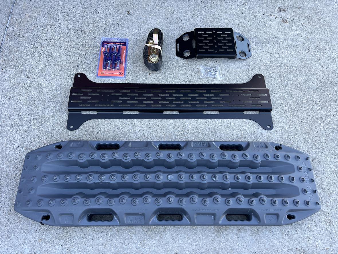 Boards Aboard Installing Overland Kitted's Spare Tire Accessory