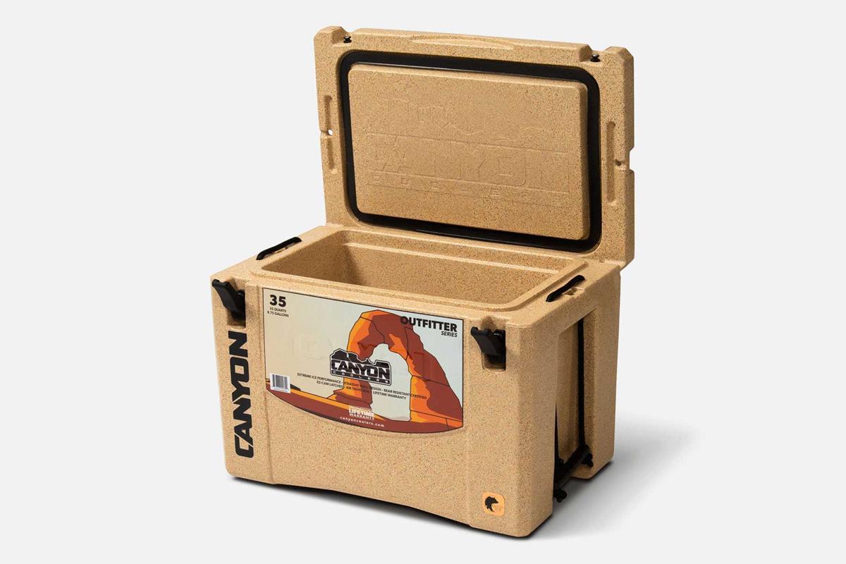 Canyon_Coolers_Outfitter_35_Sandstone_Open_Lid_Perspective-min_7e8dd321-9dce-4c91-b343-7e979cbb8dd2_1200x
