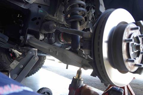 Bilstein_removing_2_bottom_bolts_lower_control_arm