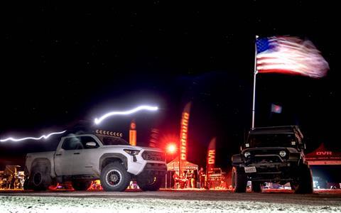 AVATHECREATIVE_OVR_Outpost_Jeep and Tacoma Night American Flag Timelapse