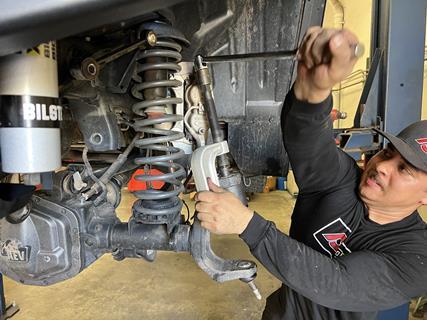 4. Before we could get to installing our Rock Jock parts, we pressed the new heavy-duty Spicer ball joints into place