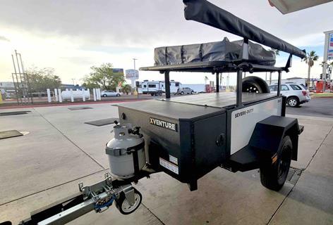 Xventures Trailer at gas station