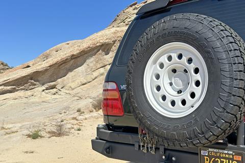 Nomad Convoy Salt and Toyo Open Country A/T III makes for a nice display on the rear of the Land Cruiser.