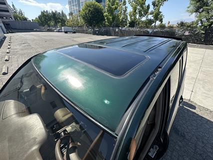 Making sure the roof is clean and its surface is protected before we install the roof rack