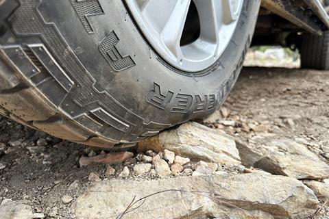 The Land Cruiser's aired down tires helps with sharp rocks