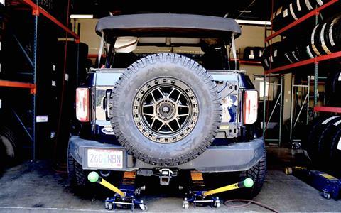 Black_Rhino_on_Milestar_tires_sparetire_on Bronco_in_garage