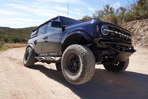 2021_Bronco_On_trail_beauty_shot_front_quarter_suspension_articulated_milestar_tires_and_black_rhino_wheels