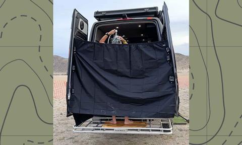 KOH-Showering-in-Outside-Van-in-desert-on-PakMule