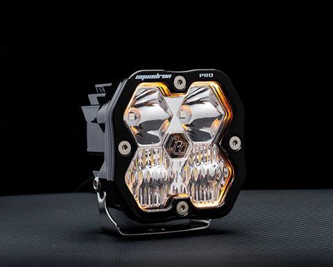 Close-up of Baja Designs Squadron 2.0 LED auxiliary light pod showing lens and compact housing design
