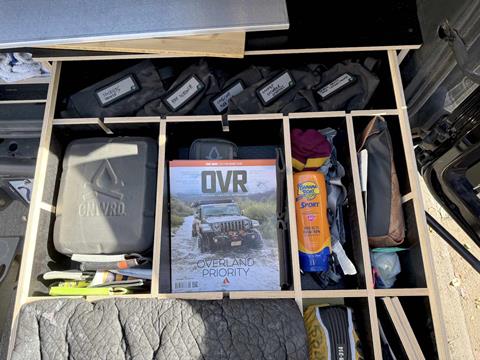 Interior organization of Bronco drawer system with separators and dividers for gear storage